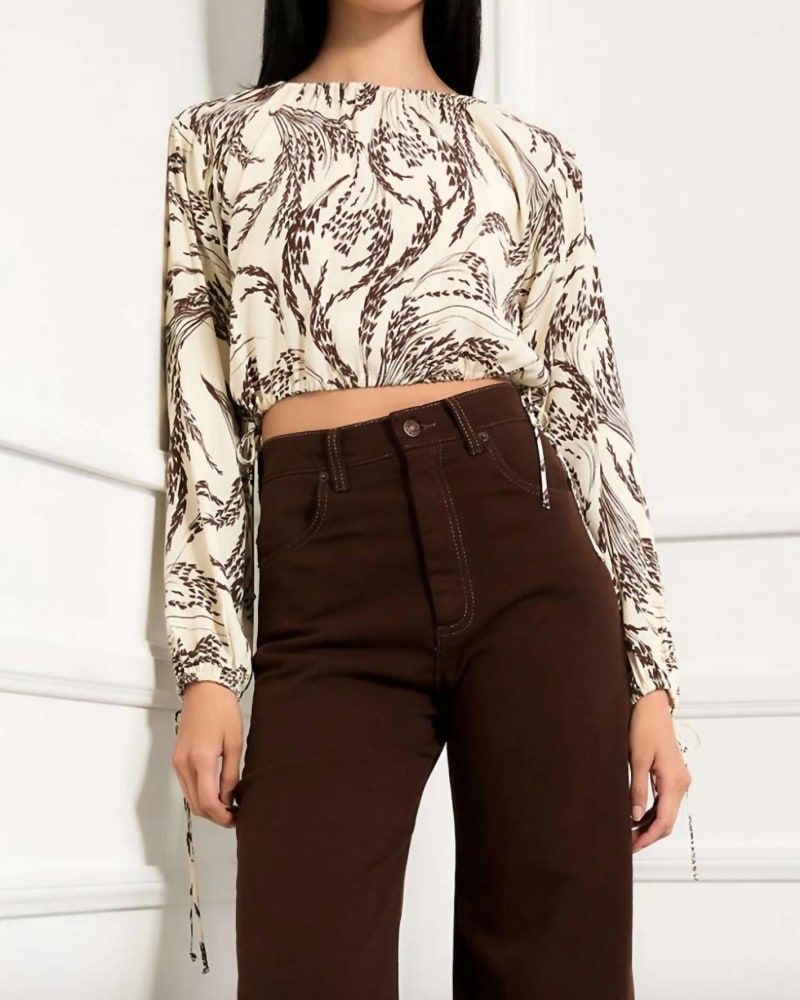 Front of a model wearing a size LG Serafina Top in Natural in Natural by R.G. Kane. | dia_product_style_image_id:333940